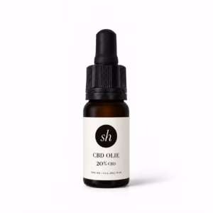 Bruin glazen pipetflesje met krachtige 20% CBD olie op een strakke achtergrond